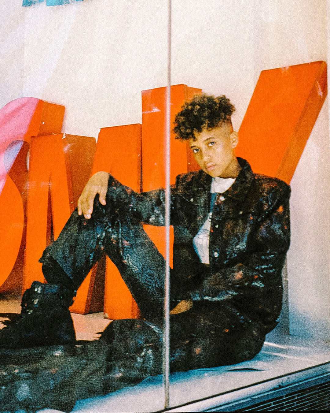 sami miro vintage snake suit suit in front of smv sign